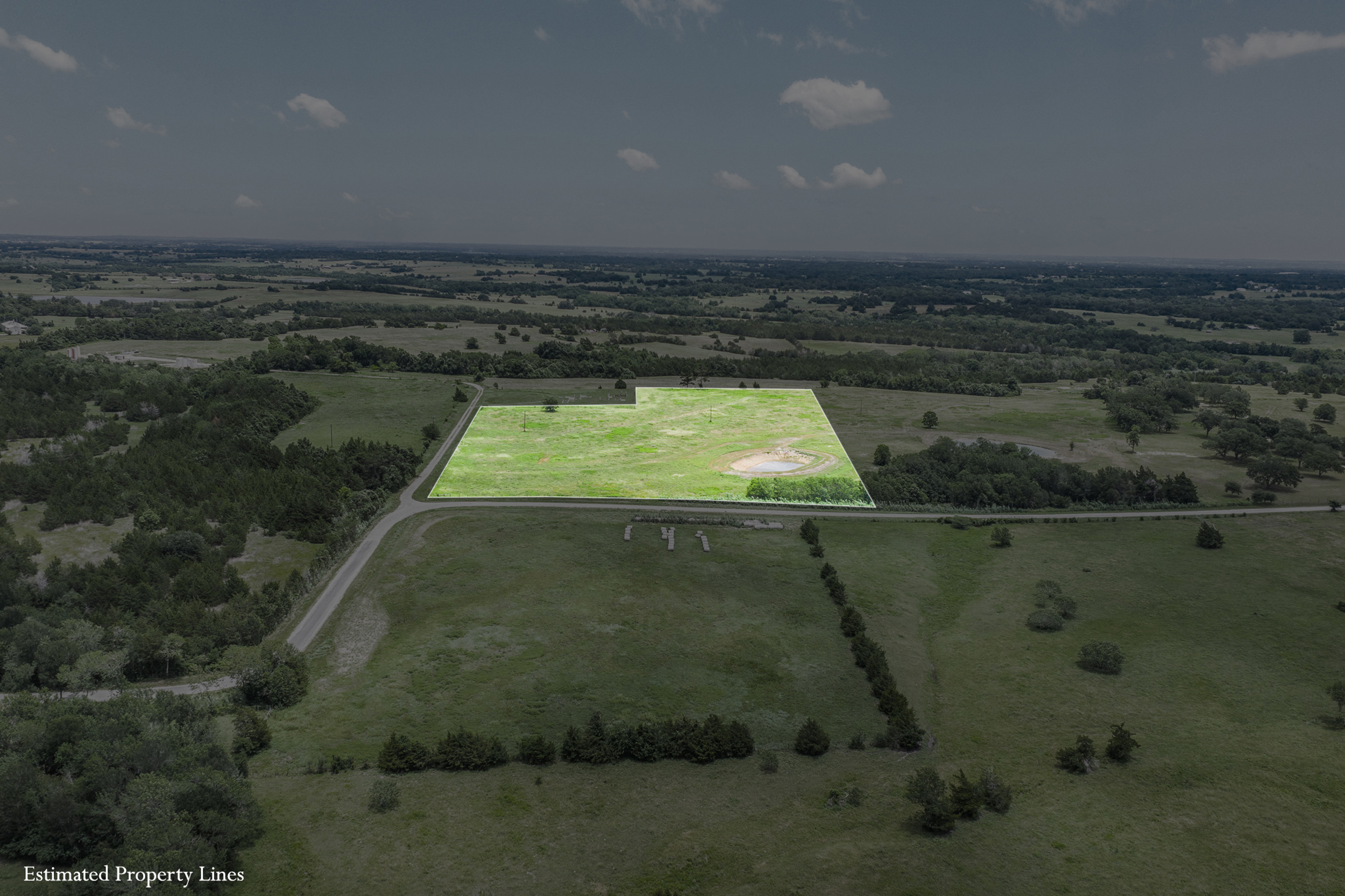 Lot 1 — sweeping aerial with water features and open sky